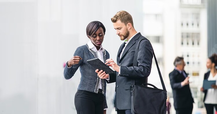 Man and woman discussing finance