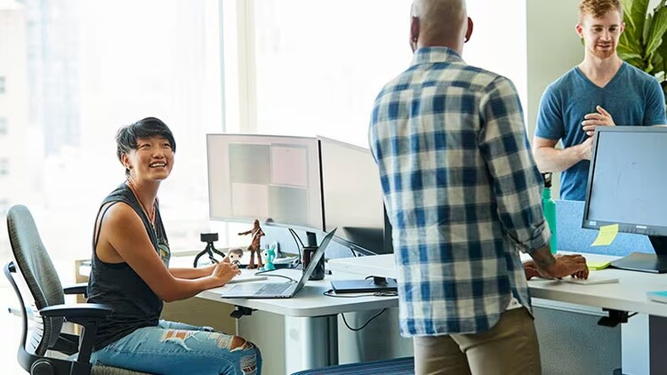 Boosting employee productivity: 3 employees in an open office