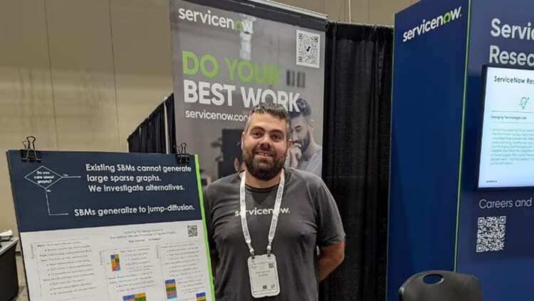 Pierre-André Noël, senior applied research scientist at ServiceNow Research, presenting his research poster
