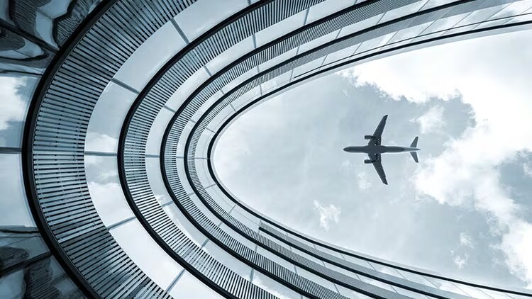 Digitalization: view of an airplane flying overhead