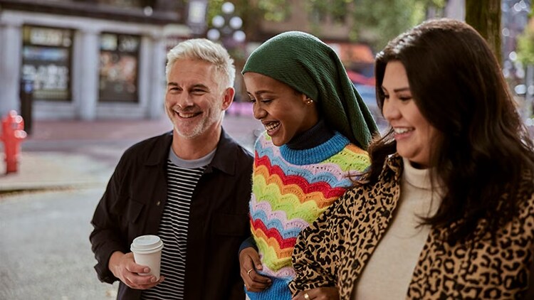 Why the world works with ServiceNow: 3 workers from different cultures walking outdoors