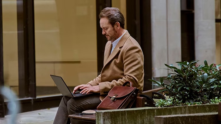 Customer support: woman working on a laptop
