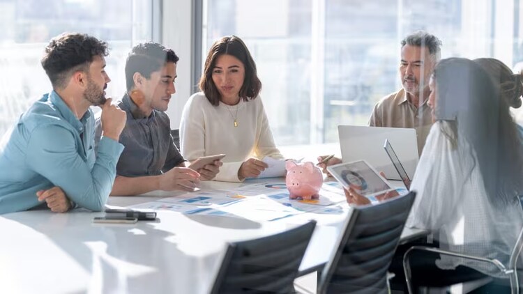 Business continuity: group of workers around a conference table