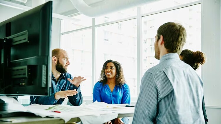 Implementer teammates in a business meeting