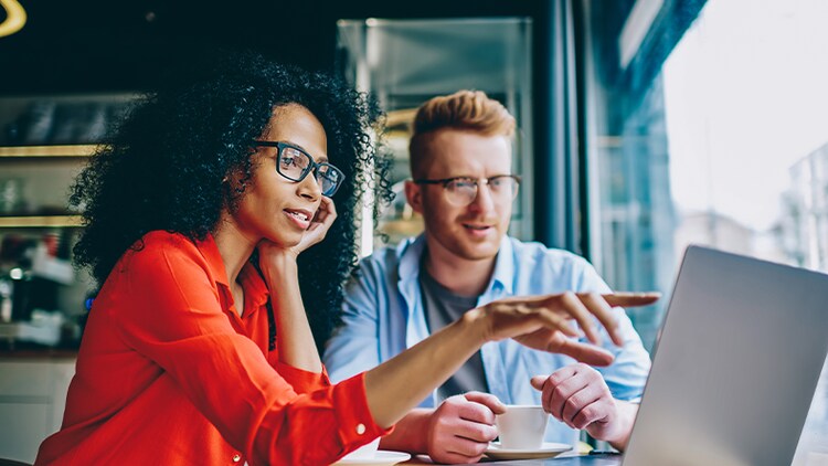 Future-proof your career: two people looking at a laptop