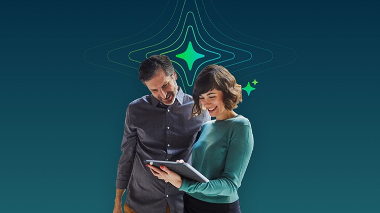 Nonprofits using AI: two people smiling at a tablet under a four-pronged star to represent AI