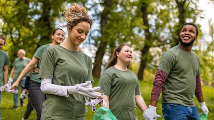 Creating access: people collecting garbage in a park