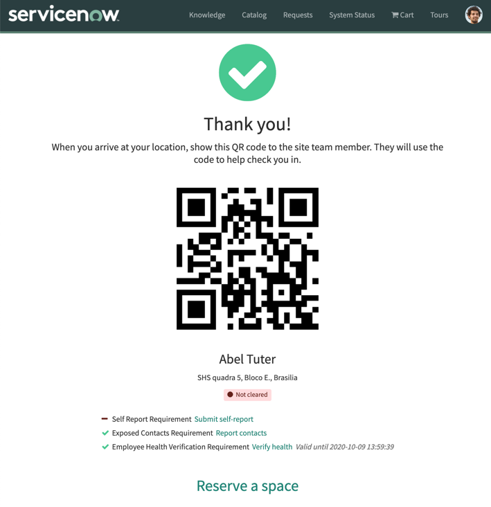 Health verification confirmation screen with QR code, instructions, and a link to reserve a workspace.