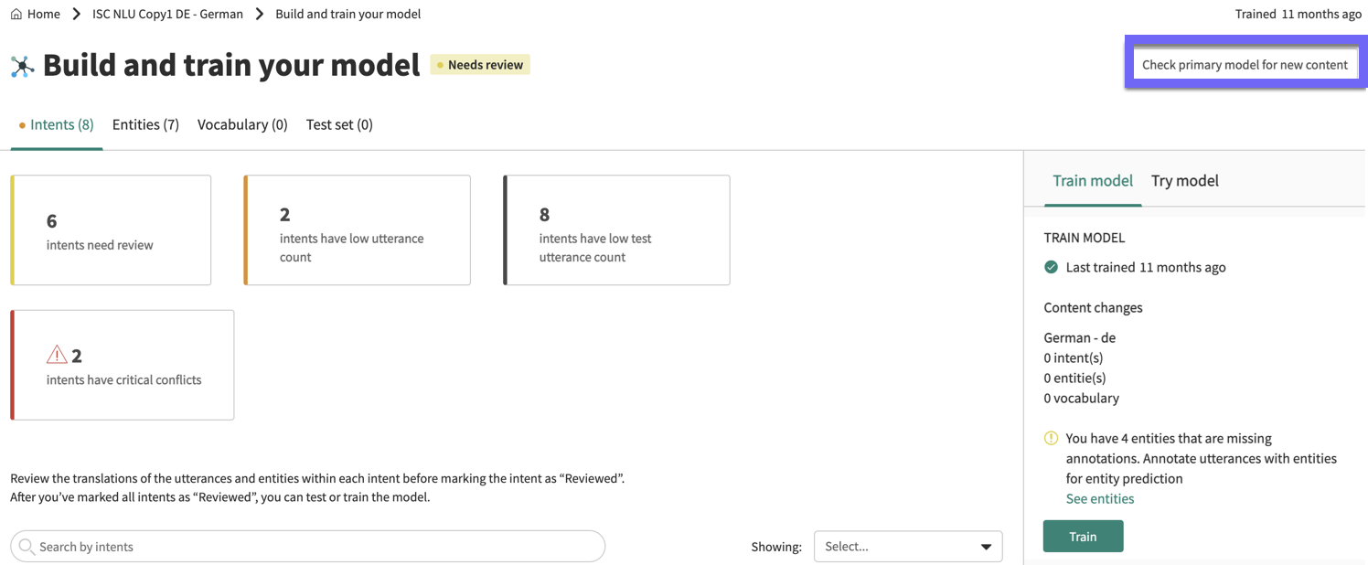The button for Check primary model for new content, on the Build and train your model phase.
