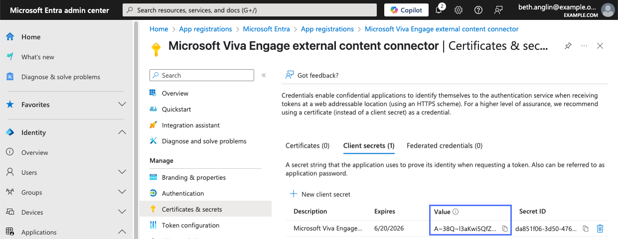Application's client secrets list in Microsoft Entra admin center showing value for newly added client secret.