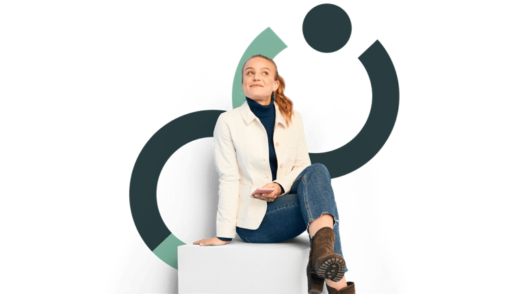 Smiling woman holding a smartphone