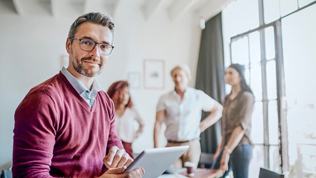 Man working on a tablet in an office