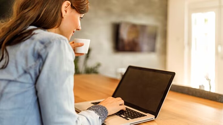 banking: lady sat working on laptop