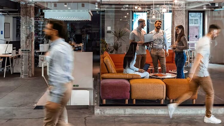 HR shared services: workers moving about an office