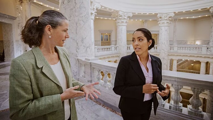 Politicians talking in government building
