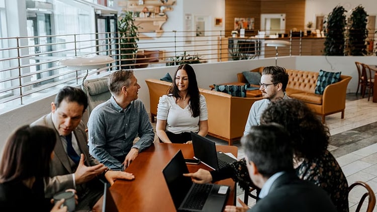 Risk-readiness and organisational resilience: workers collaborating in a business meeting