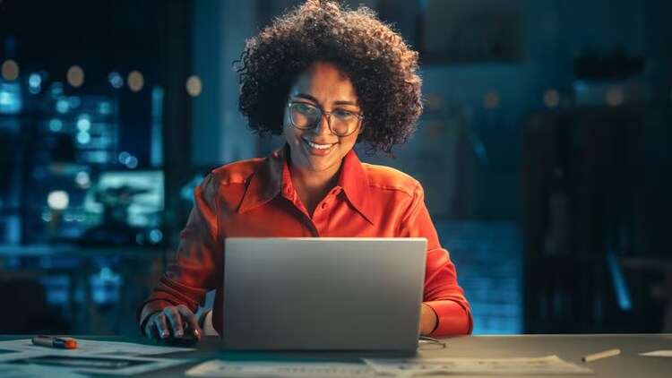 Future of low-code: female working on laptop