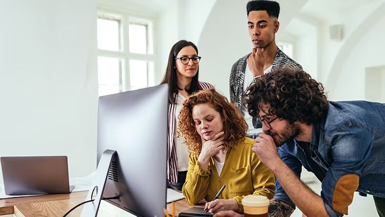 Group of creative businesspeople working together on a project