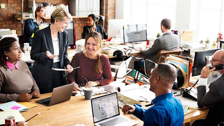 Employees in a busy office environment