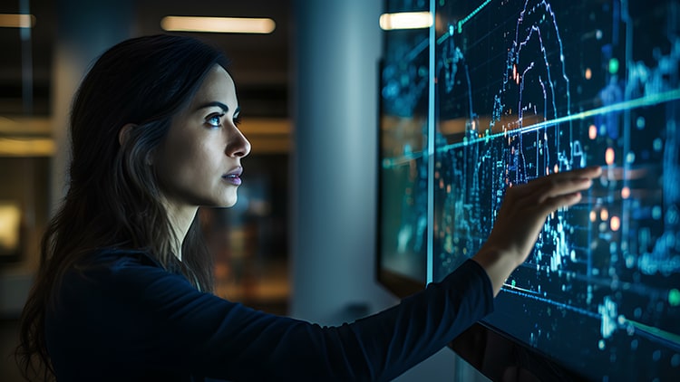 AI-first organisations: woman tapping a computer screen